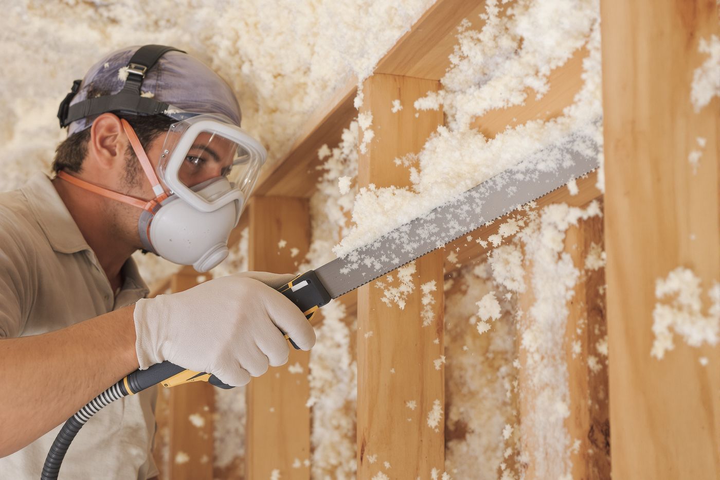 Spray foam insulation being applied to a roof or attic assembly in a Glenpool, Oklahoma home